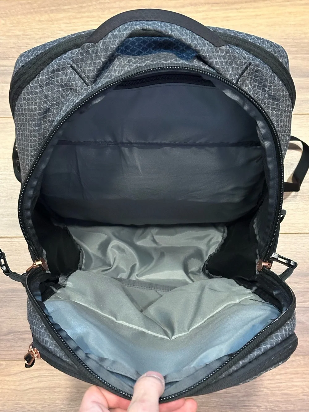 The North Face Surge Backpack in TNF Black Heather Copper/TNF Black